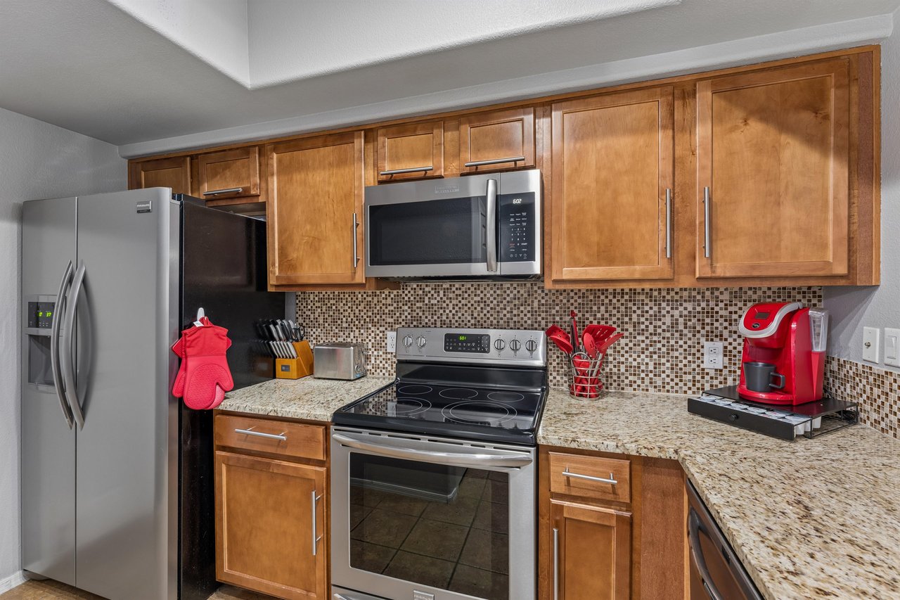 Stainless steel appliances and cooking essentials.
