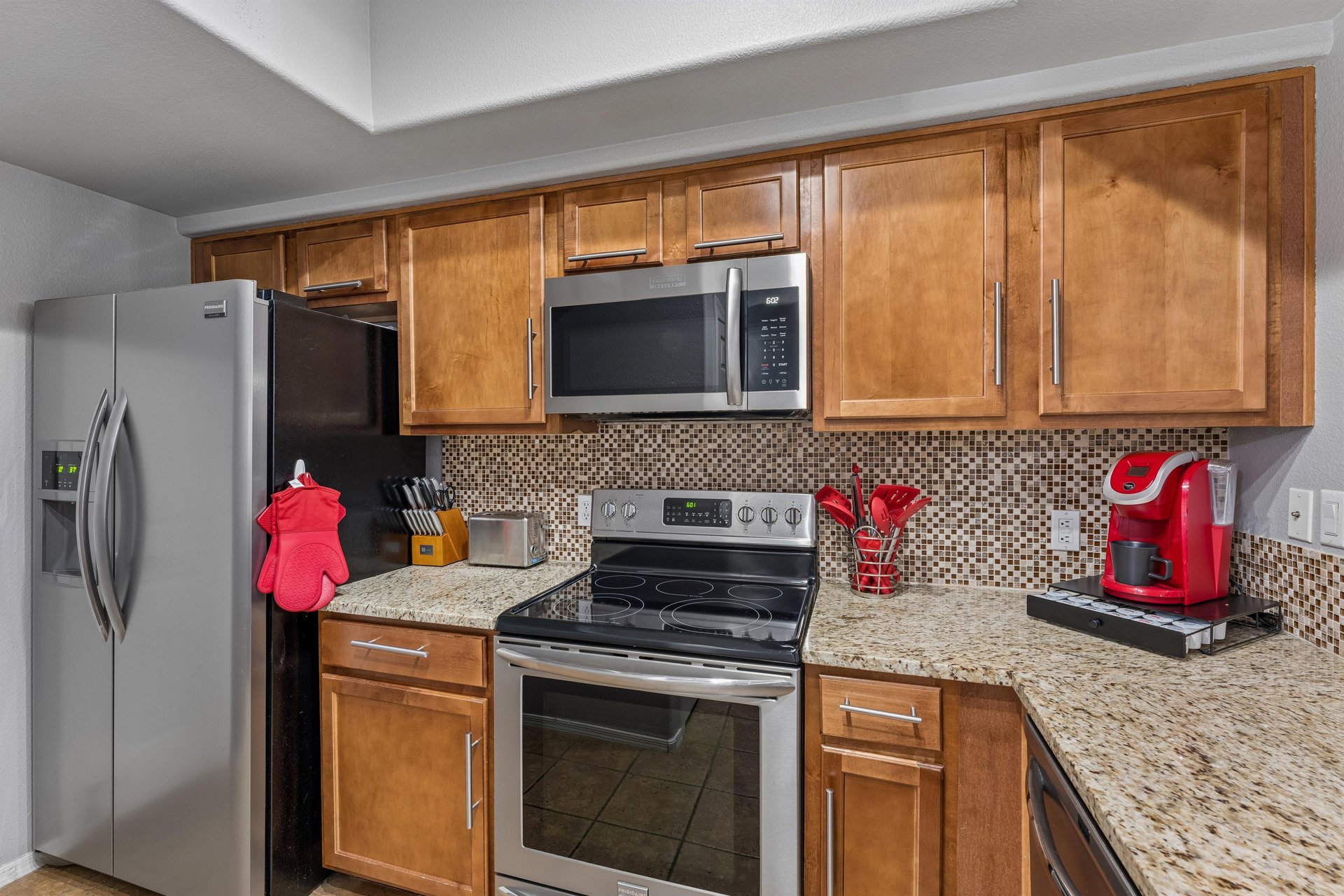 Stainless steel appliances and cooking essentials.