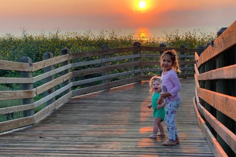 Girls on boardwalk