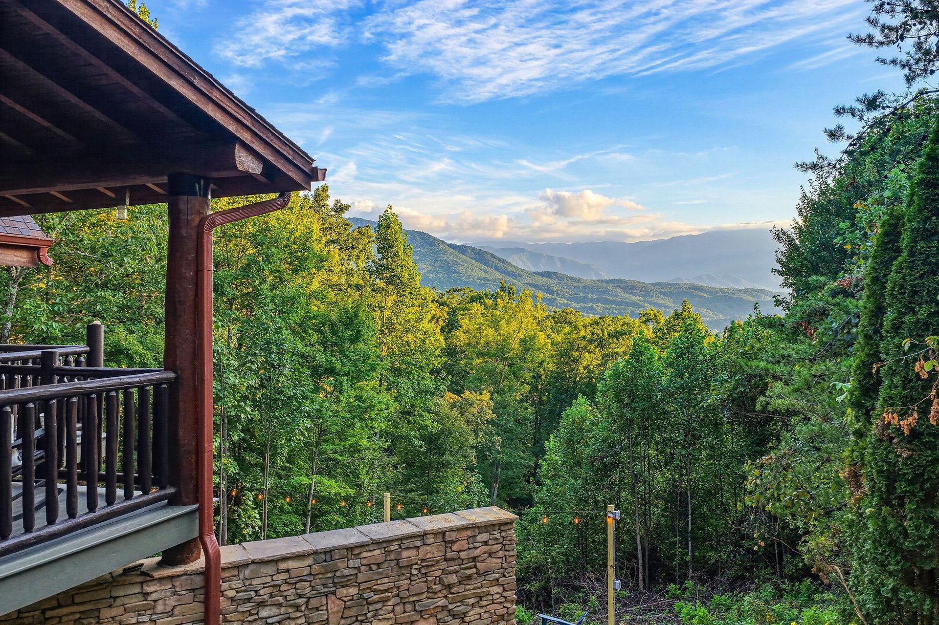 Step onto your private balcony and take in sweeping mountain vistas framed by lush forest. Breathe in the fresh air and savor peaceful moments against this stunning natural backdrop.