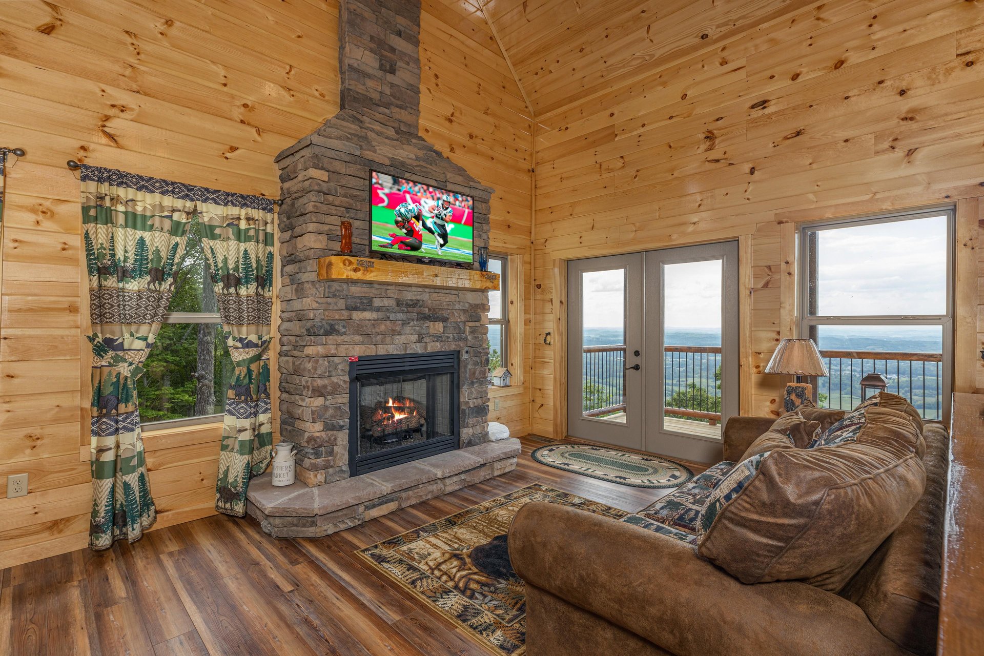 Living room with stone fireplace