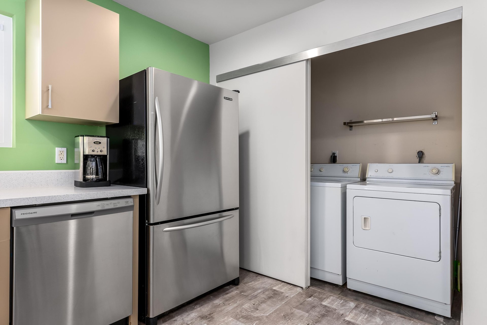 Laundry room next to the kitchen
