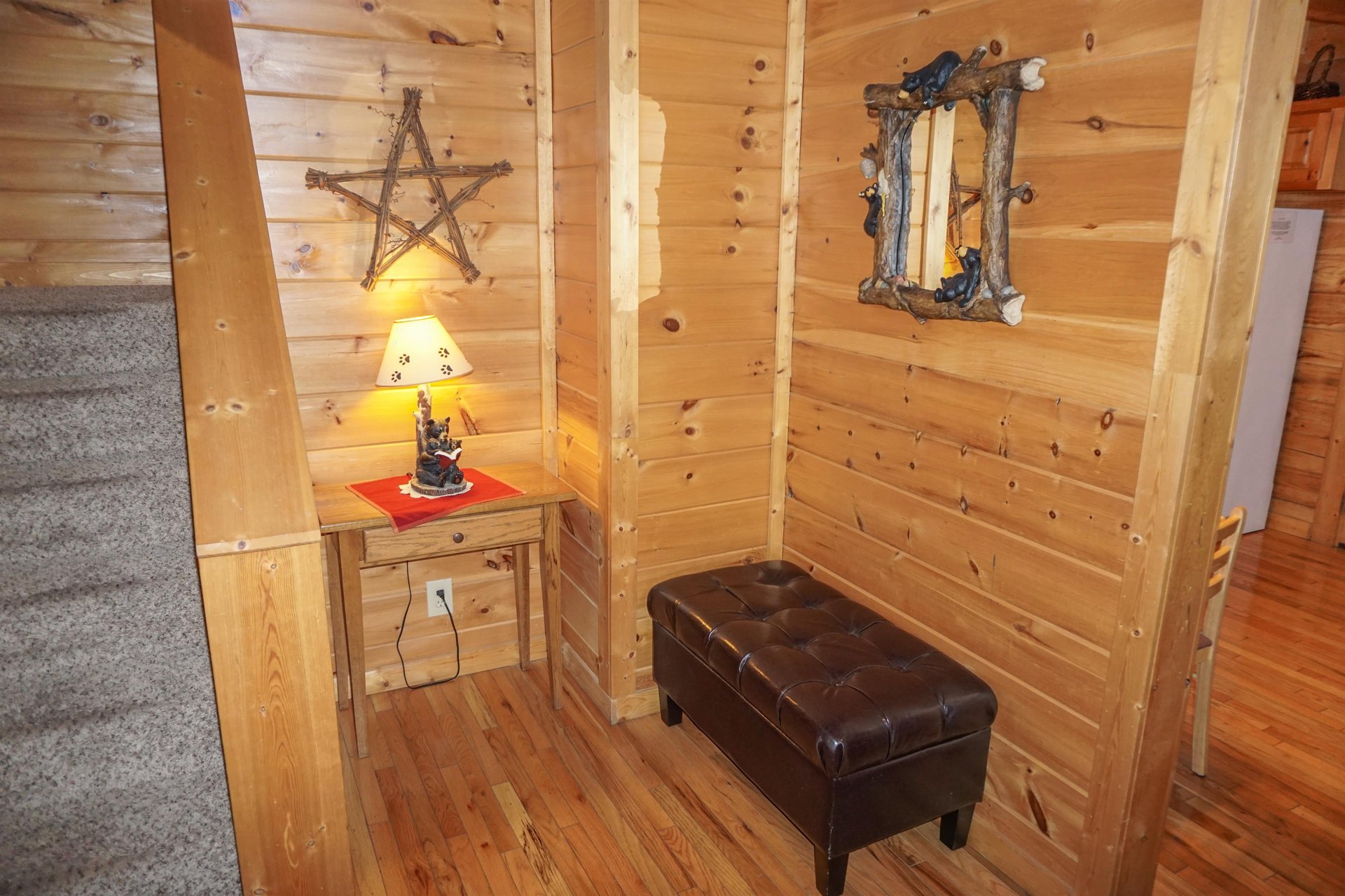 Bench in the foyer at Bearly Mine, a 1bedroom cabin rental located in Pigeon Forge