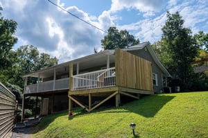 Back of Ole Bud Cabin with small hot tub deck