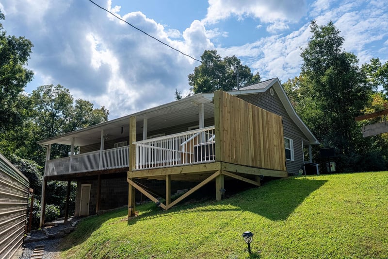 Back of Ole Bud Cabin with small hot tub deck