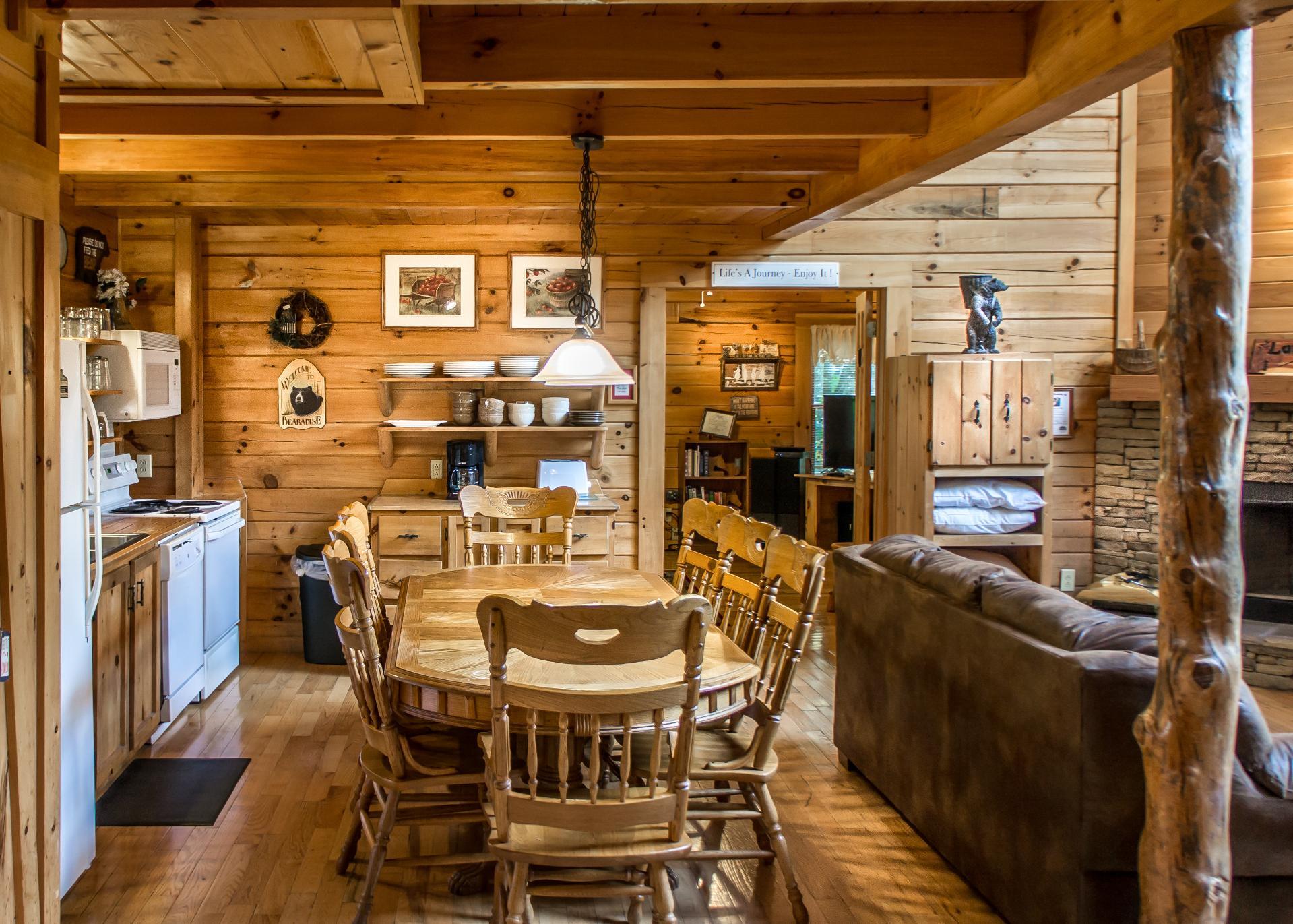 Prepare meals with ease in the wellequipped kitchen and enjoy group dinners at the eightperson dining table.