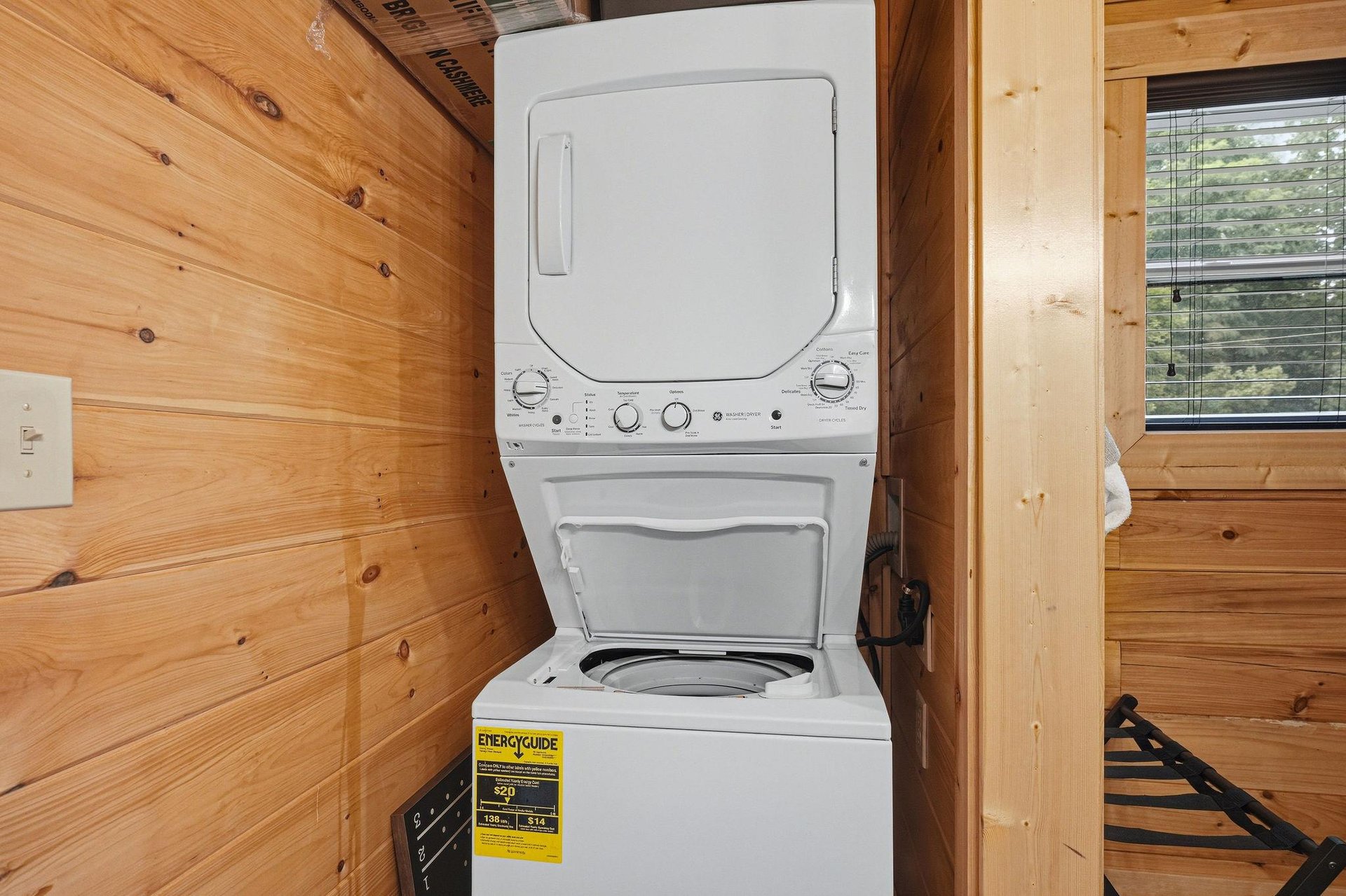 Convenient inunit laundry combo makes it easy to pack light and keep your clothes fresh throughout your stay in this cozy cabin.
