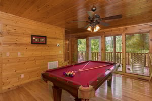 Pool table in the game room at Kick Back  Relax A 4 bedroom cabin rental located in Pigeon Forge