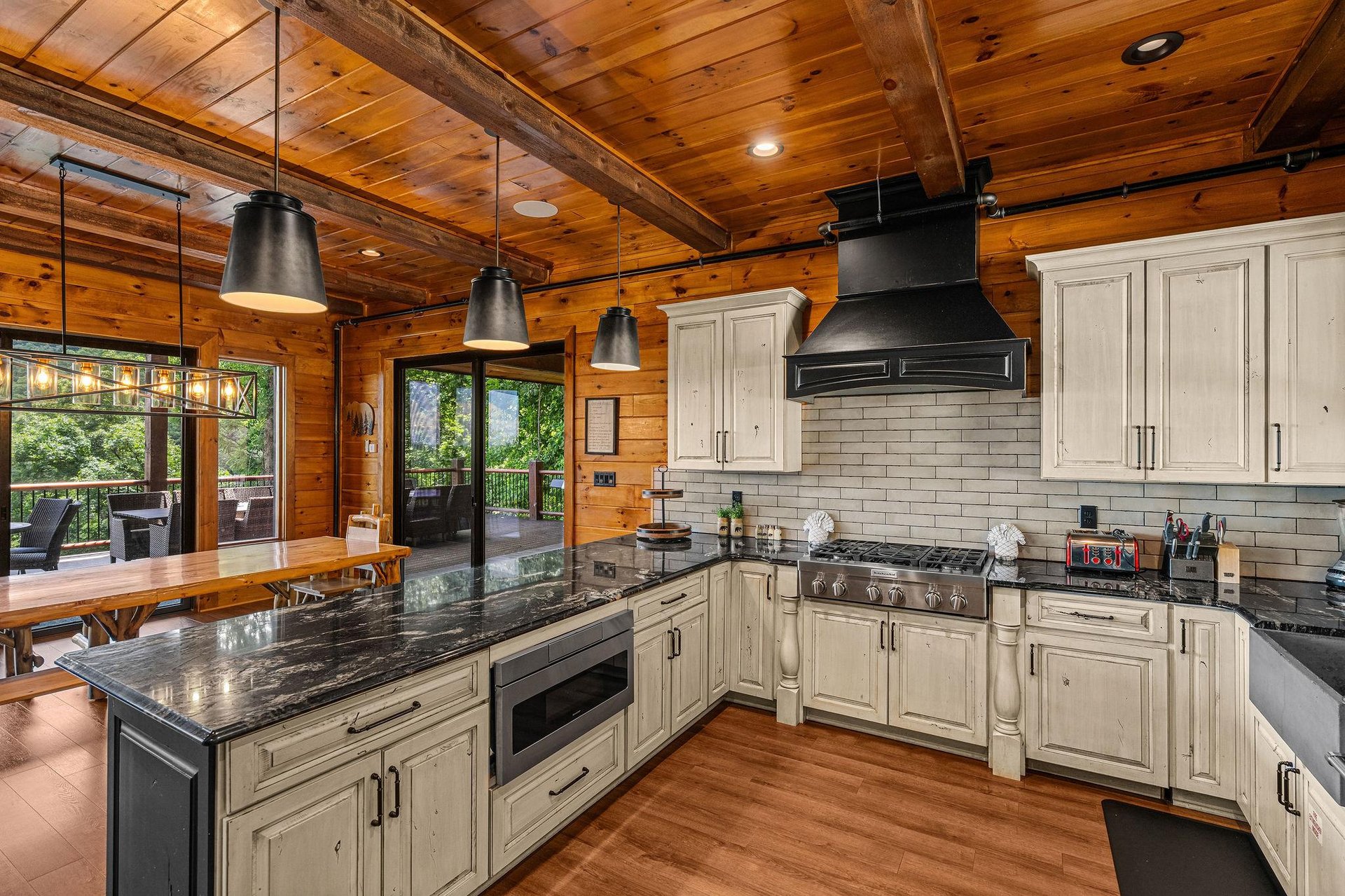 Kitchen with breakfast bar and eat in dining table