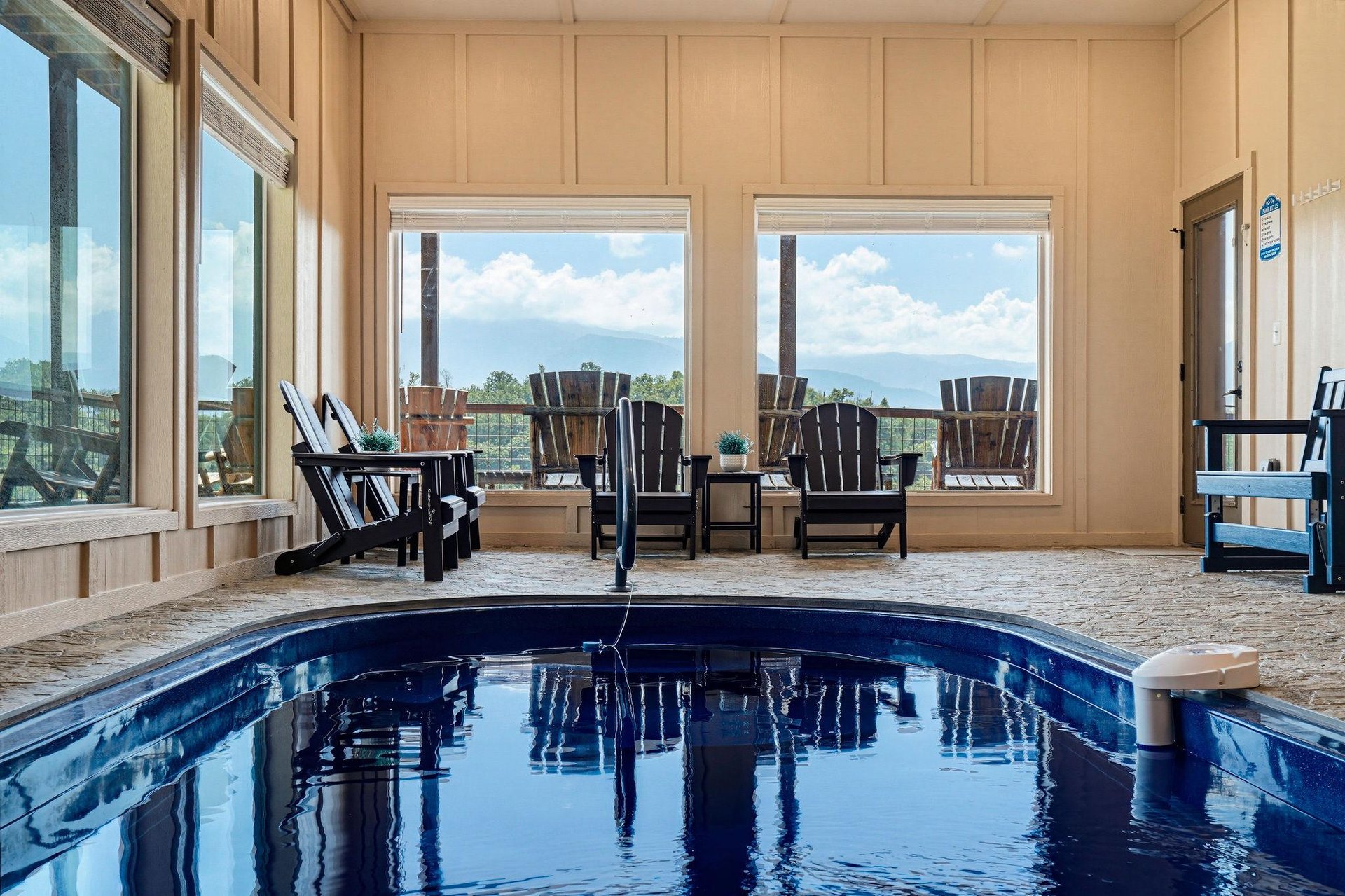 Step into your private indoor pool retreat with sweeping mountain views. Sink into an Adirondack chair after your swim and let the layered peaks and open sky become your daily backdrop.