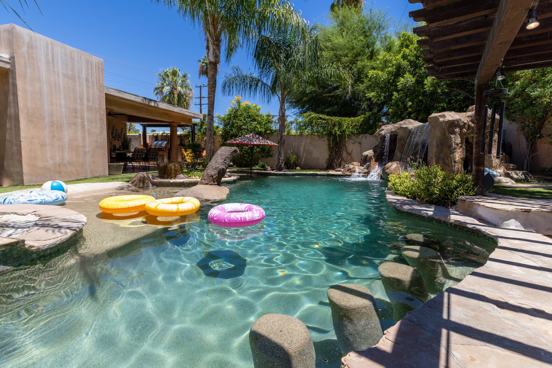Incredible lazy river with waterfalls, 2 grottos, and a waterslide.