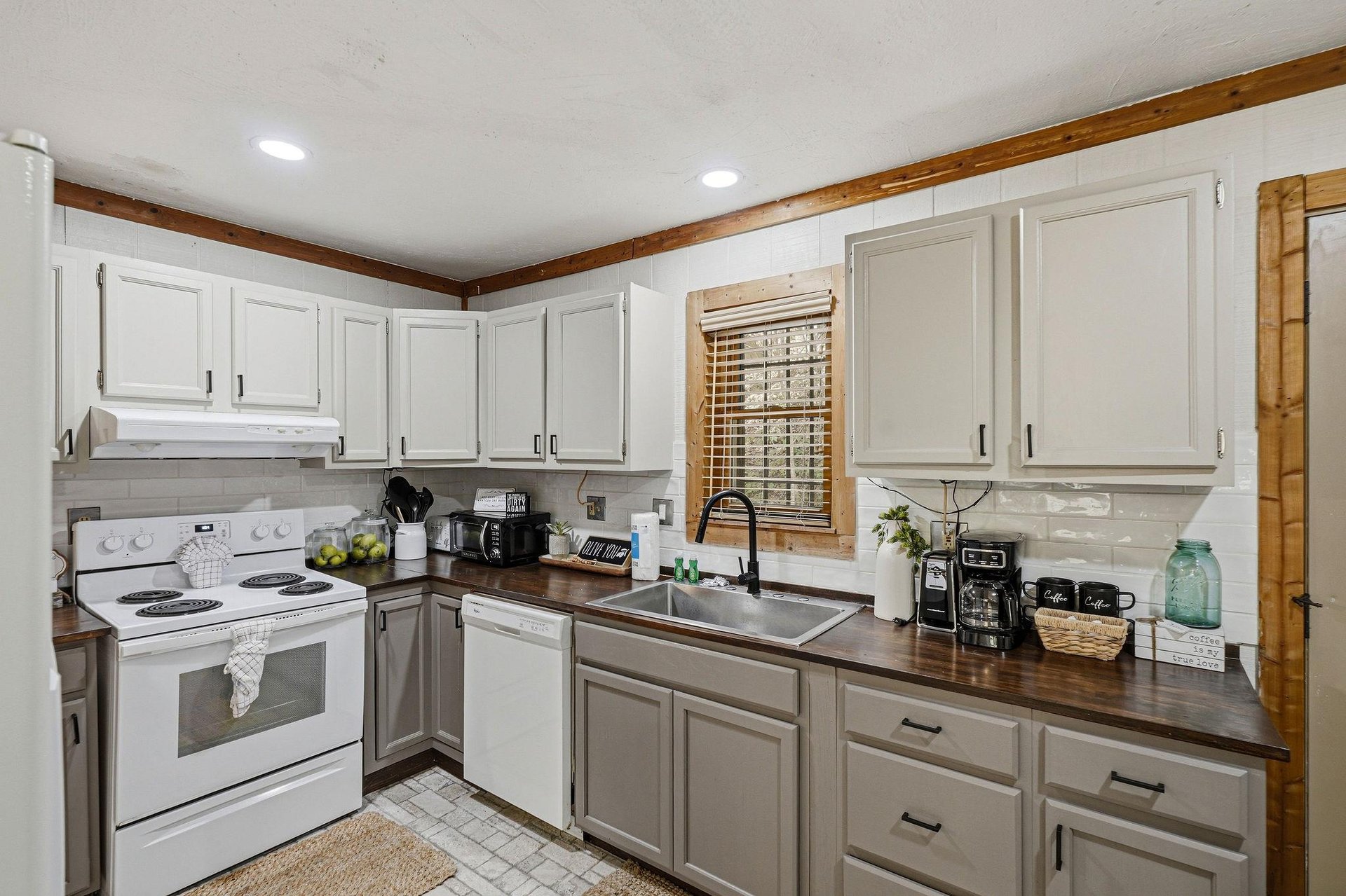 Your fully equipped kitchen offers everything needed to create memorable meals during your stay, from morning coffee to family dinners.