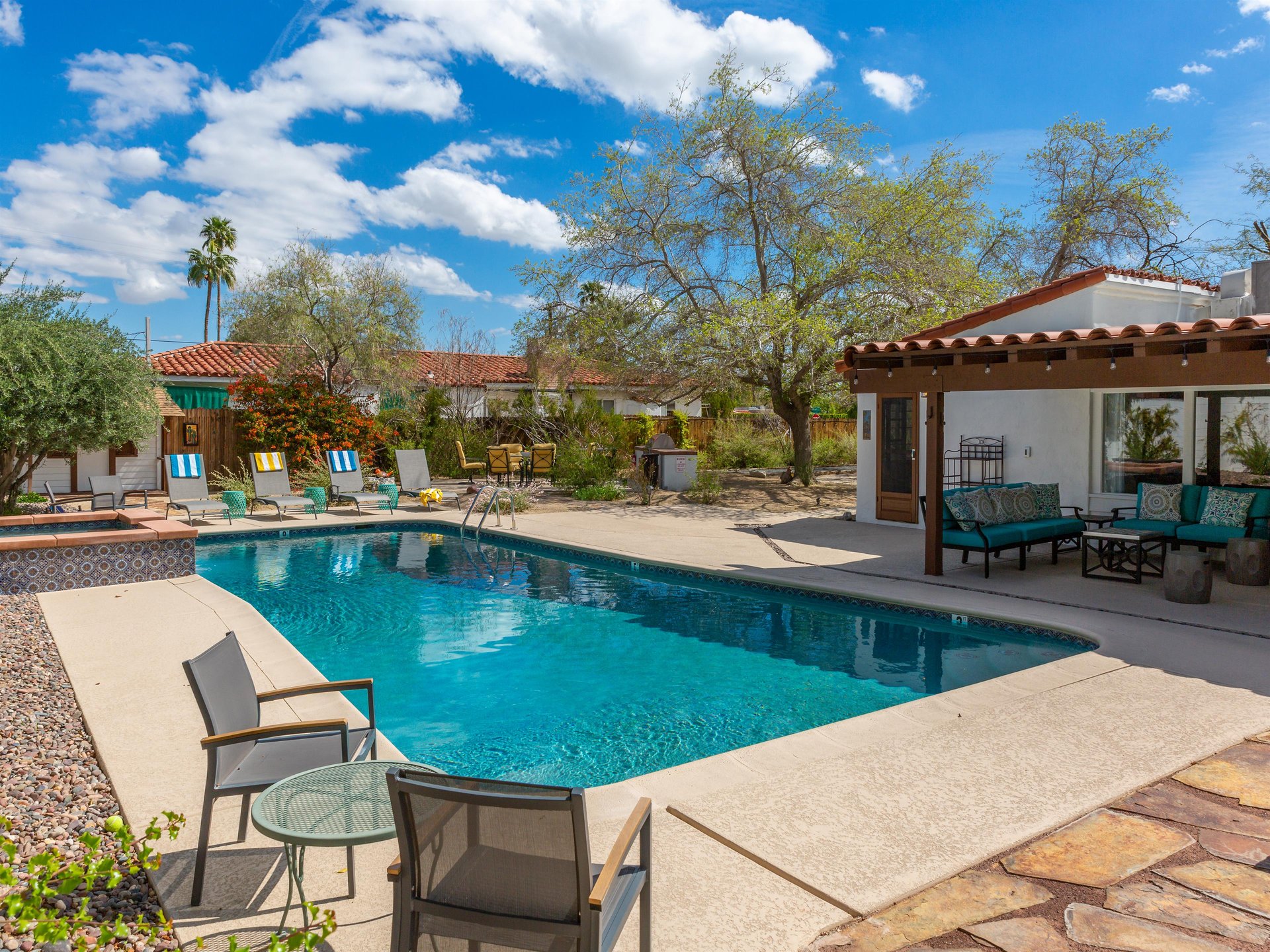 Enjoy the sun drenched poolyard
