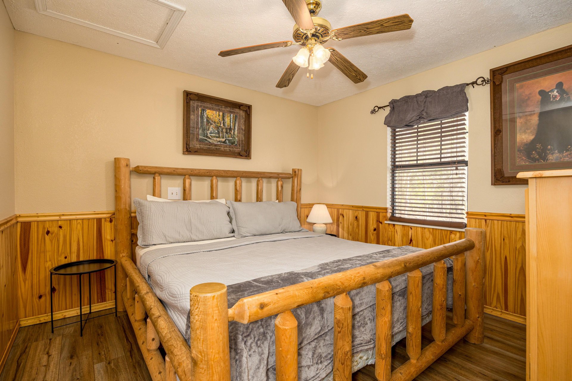 Log bed at Liams Lookout, a 2 bedroom cabin rental located in Pigeon Forge