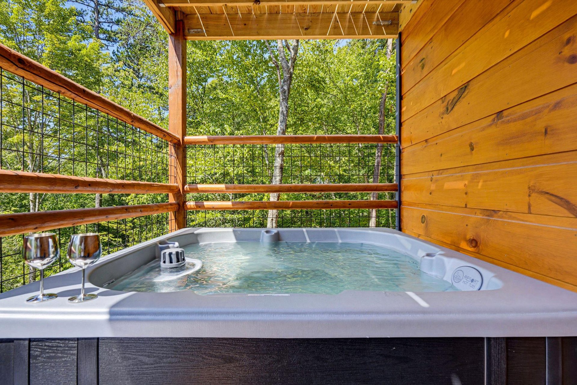 Soak away your worries in your private hot tub while breathing in fresh forest air and gazing at lush green canopy all around.