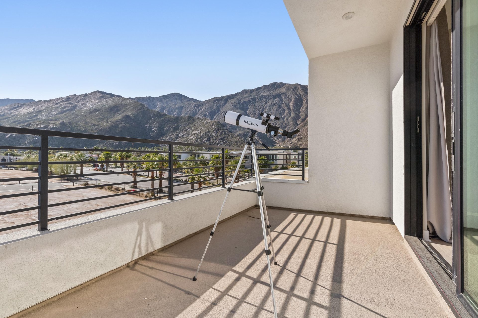 Private balcony where a telescope awaits