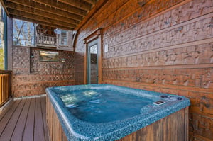 Soak your cares away in your private hot tub, nestled on a covered deck surrounded by warm wood and peaceful mountain air—a perfect retreat after a day of adventure.