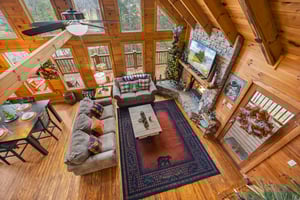 Living room view with stone fireplace