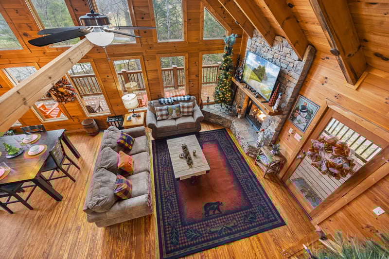 Living room view with stone fireplace