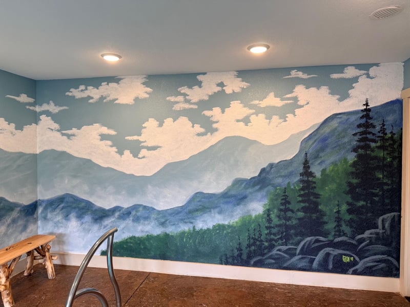 Unwind in your peaceful space featuring a stunning mountain landscape mural that brings natures tranquility indoors.