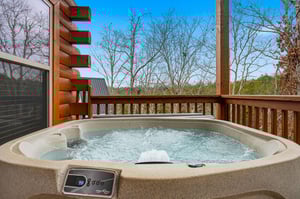 Soak in your private hot tub surrounded by forest views and peaceful mountain air.