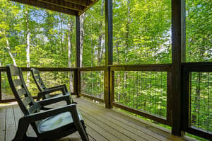 Settle into your own secluded haven and let birch trees and vibrant greens envelop you in natural tranquility.