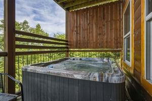 Step into your private hot tub surrounded by lush greenery. Soak away stress while fresh air and natures sounds embrace you on this peaceful covered terrace.
