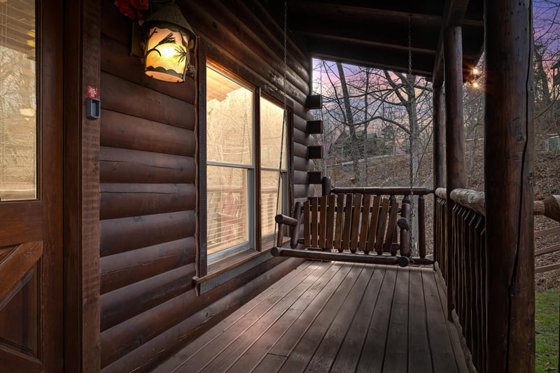 Deck swing at Country Bears Getaway, a 3bedroom cabin rental located in Gatlinburg