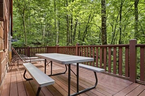 A peaceful wooded property tucked into a lush natural forest setting, offering privacy and seclusion during your mountain getaway.