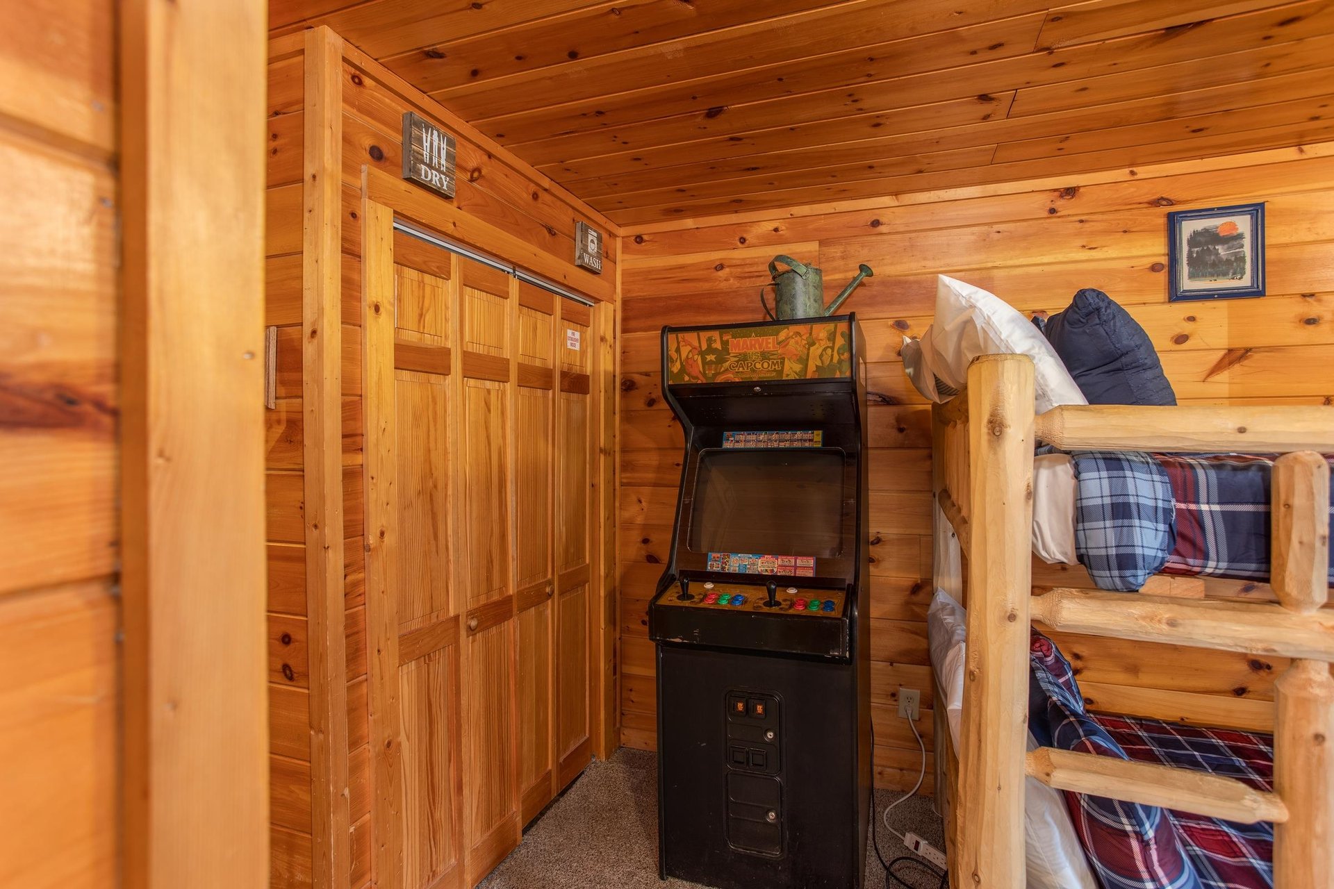 Arcade game in the game room at Hibernation Station, a 3bedroom cabin rental located in Pigeon Forge