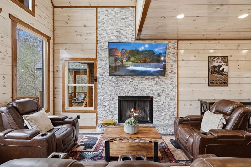 Cozy up in your mountain retreat with plush leather seating, crackling fireplace, and rustic charm.