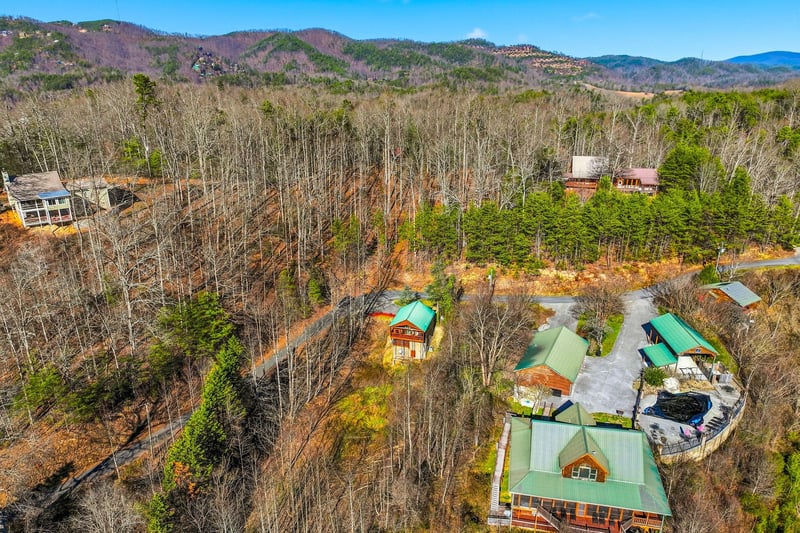 Mountain retreat nestled in rolling hills with forest views and peaceful surroundings.