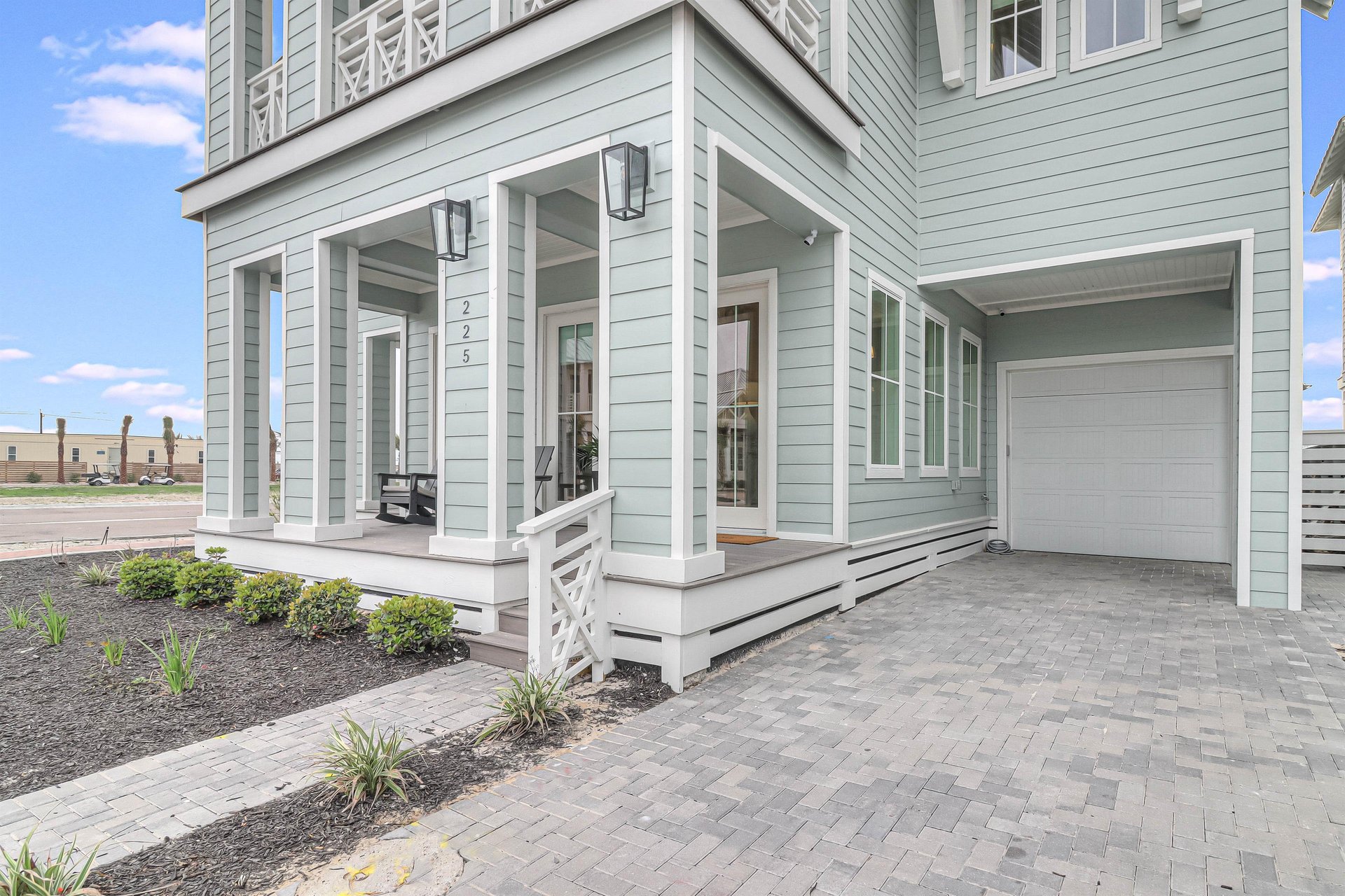 Front Patio and Outdoor Shower Off Driveway