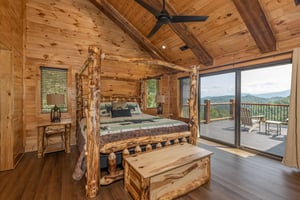 Four post king log bed
