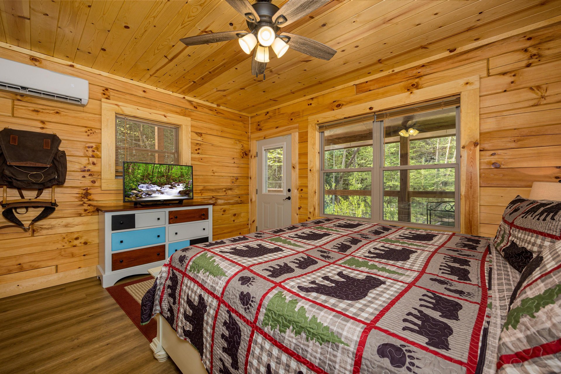 King bed facing dresser and tv
