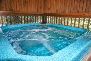 Hot tub at Bearly Mine, a 1bedroom cabin rental in Pigeon Forge
