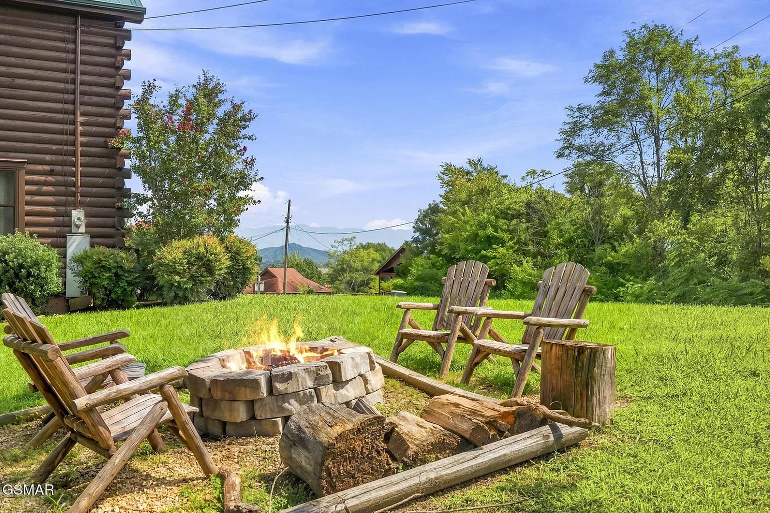 The property is nestled in a scenic mountain valley surrounded by lush greenery and natural beauty.