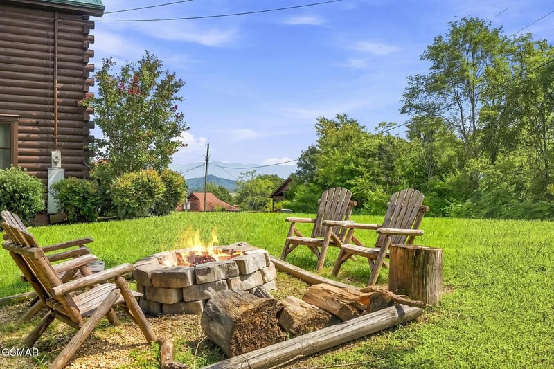 The property is nestled in a scenic mountain valley surrounded by lush greenery and natural beauty.