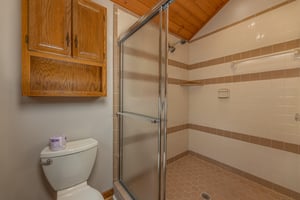 Shower in a bathroom at Cubs Crib, a 3 bedroom cabin rental located in Gatlinburg