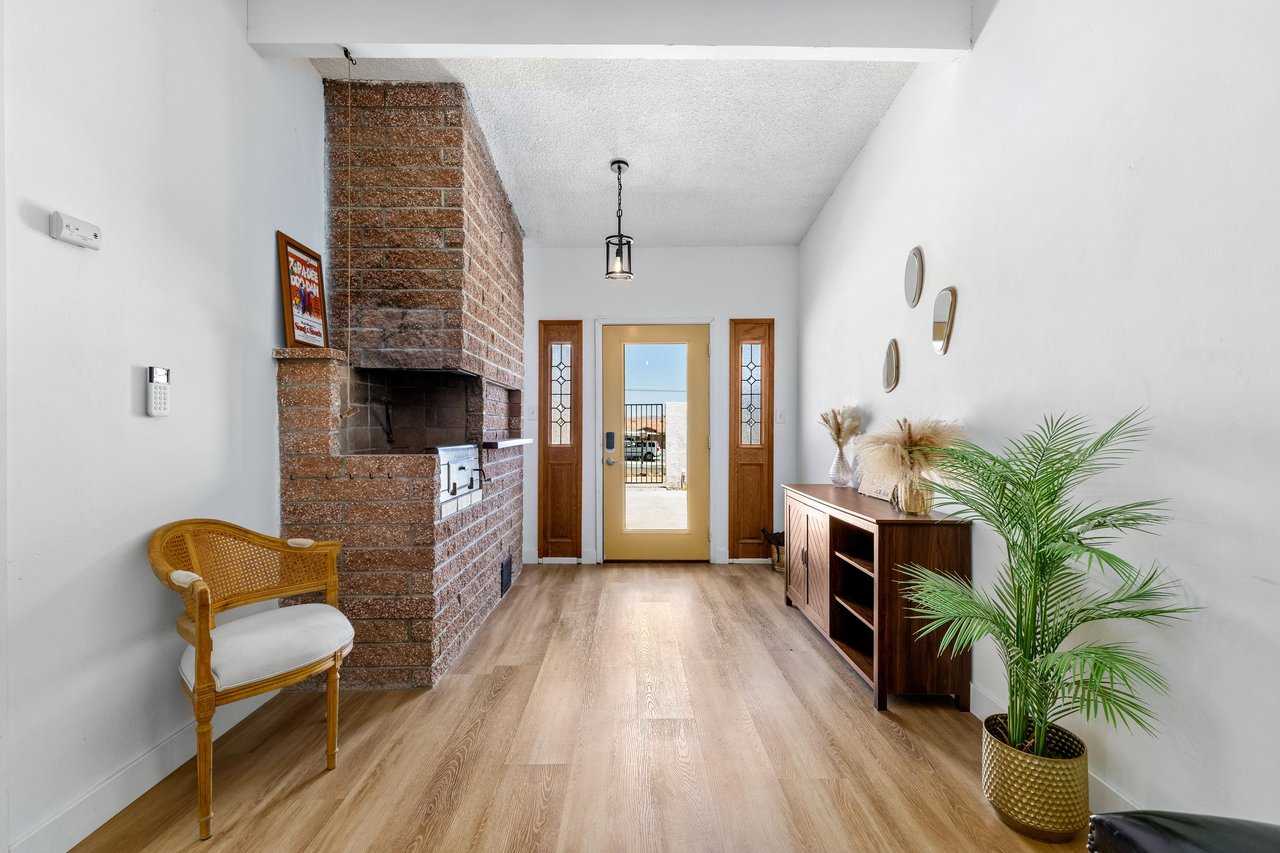 View of the front door and entryway into the home.