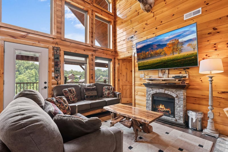 Living room with stone fireplace