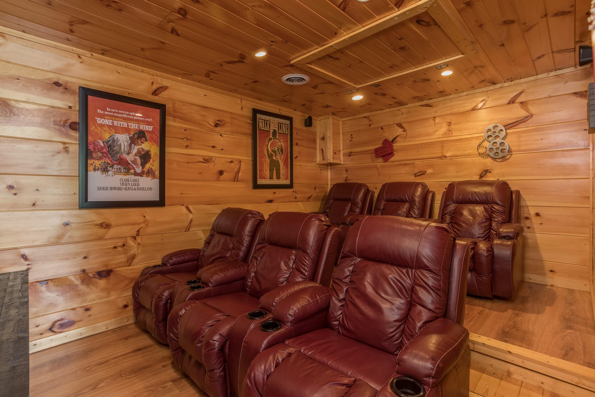 Large recliners in the theater room at Graceland, a 4bedroom cabin rental located in Pigeon Forge