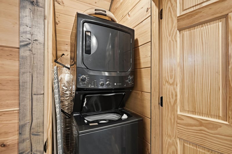 Your own private laundry setup makes extended stays effortless, with fullsize washer and dryer tucked into beautiful woodpaneled surroundings.