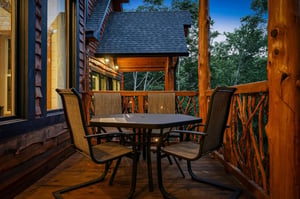 Picture yourself unwinding on this private deck, surrounded by towering trees and peaceful mountain air. Perfect for your morning coffee or evening stargazing under the open sky.