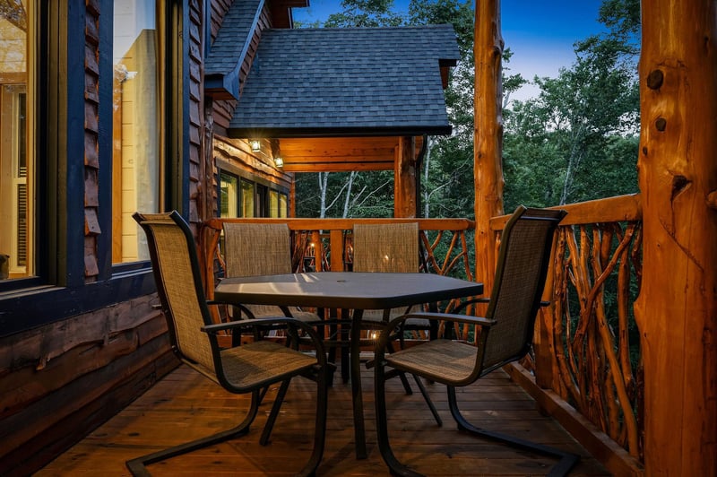 Picture yourself unwinding on this private deck, surrounded by towering trees and peaceful mountain air. Perfect for your morning coffee or evening stargazing under the open sky.