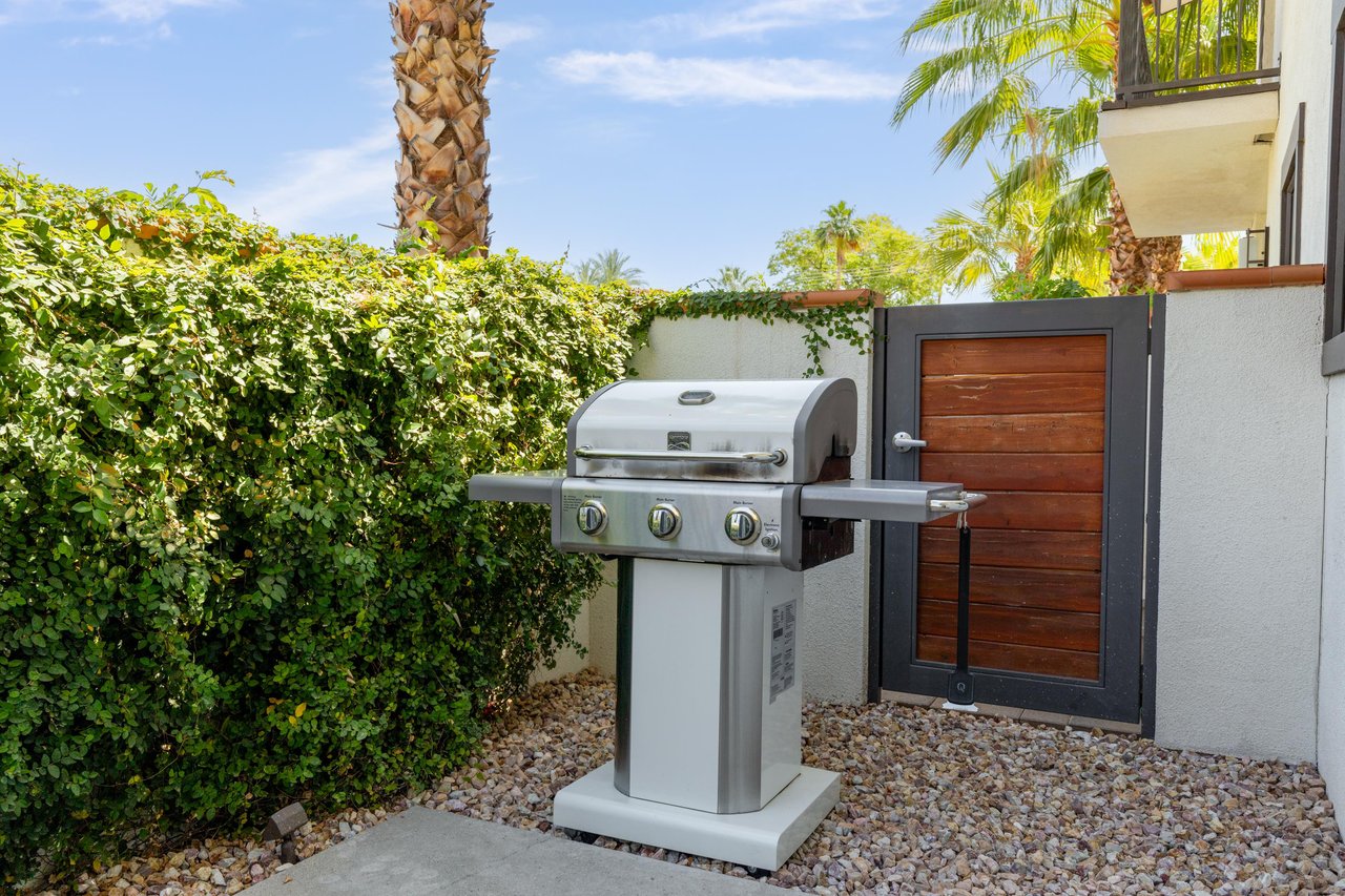 Shared grill located on the side of the condo.
