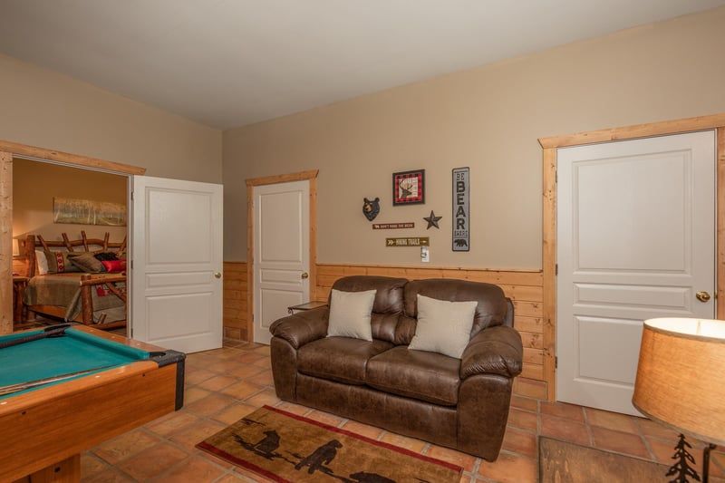 Love seat near pool table