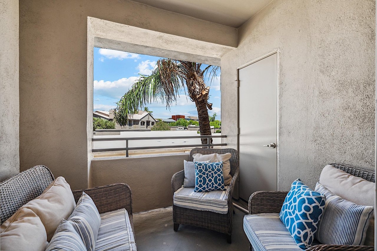 Balcony  Has outdoor love seat and two comfy sitting chairs