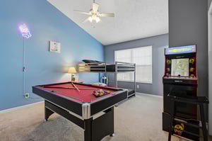 Challenge friends to pool or arcade games in your funfilled game room with bunk beds for extra guests.
