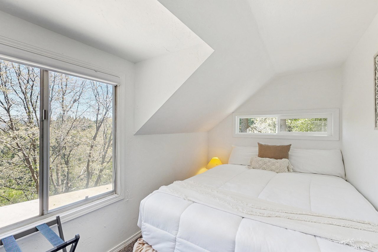 Features a queen size bed.